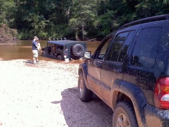 sunk in Upatoi creek, Ft. Benning Ga.  Took this Liberty and a Wrangler both with snatch blocks, and a compined pulling power of around 36,000 lbs to get Big Sarge unstuck, only 5 feet from the bank and in 10 inches of water.  lol