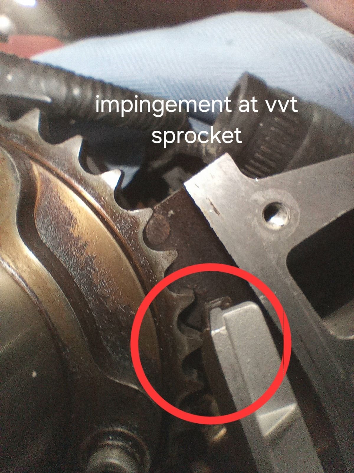 This is not bolted in, just riding on pin. The rib also interferes with the cover here.