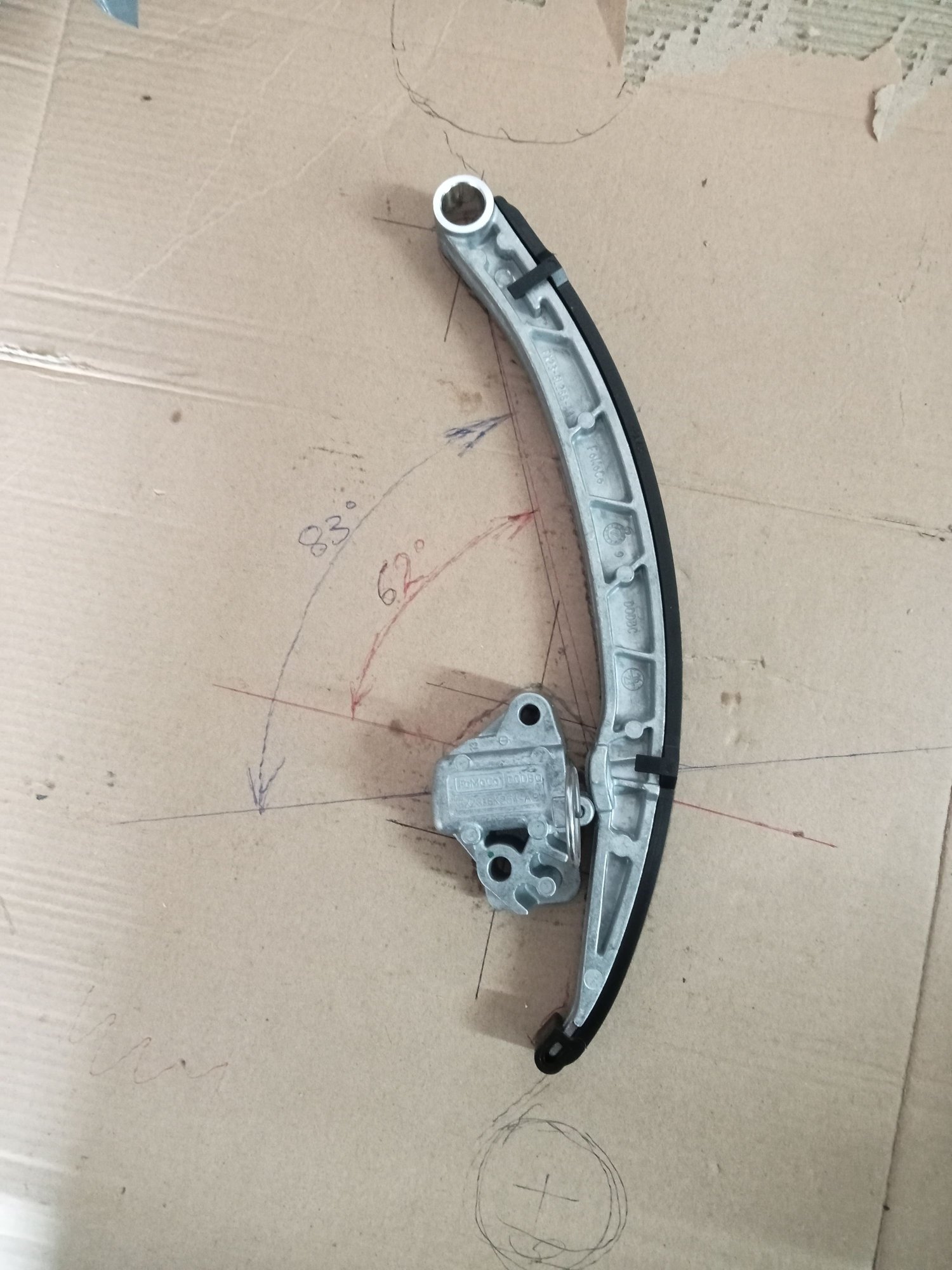 Latest tensioner and blade with steel insert. Same mounting points, new angle of 83 degrees between piston and blade movement.