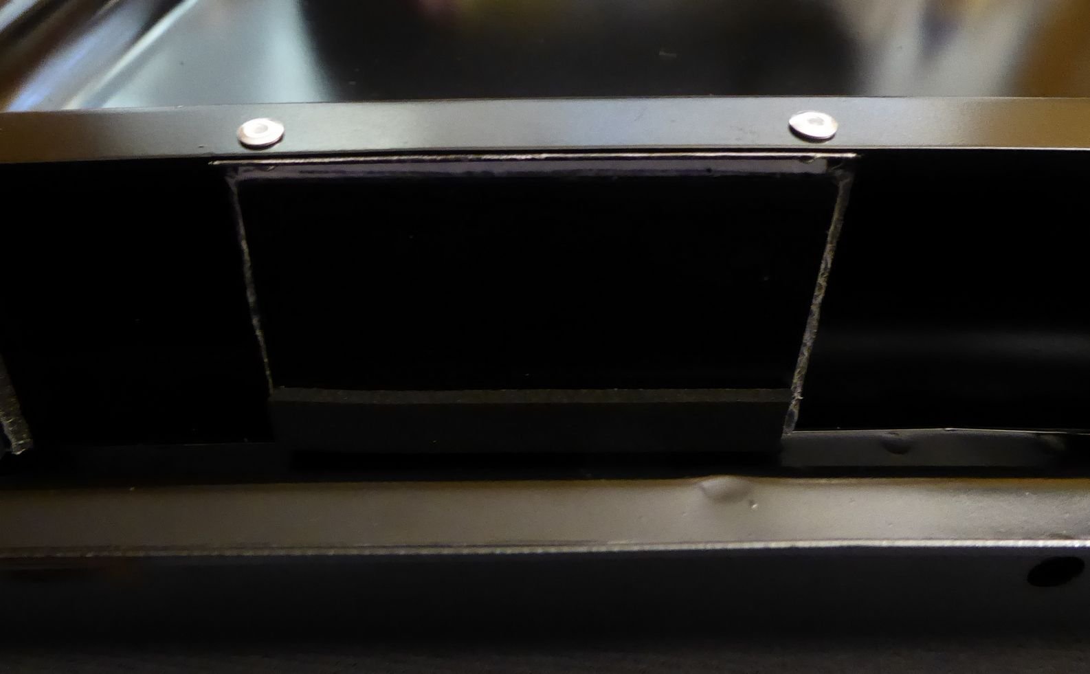 Vent flap riveted back into place. No foam or sealant on tray yet.