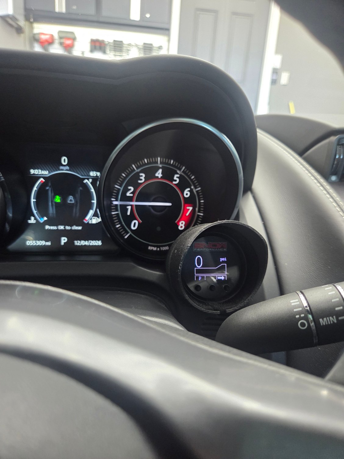 Snow Performace water meth control mounted by instrument cluster.