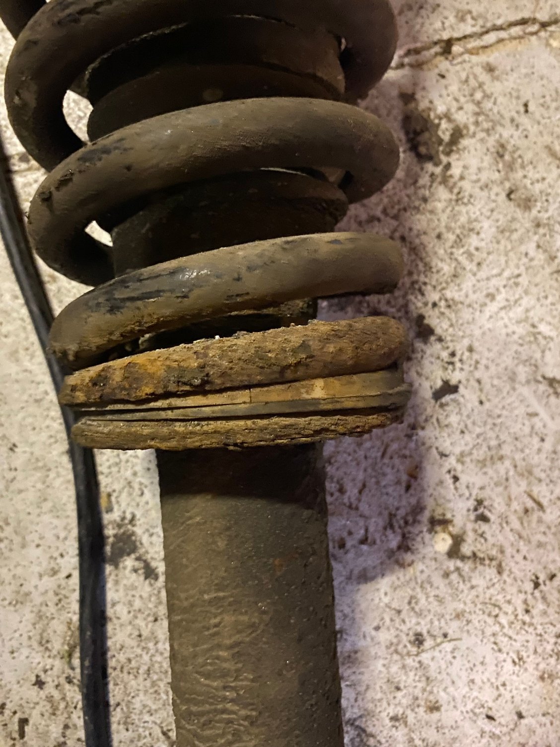 Shallow wedged packer on original spring