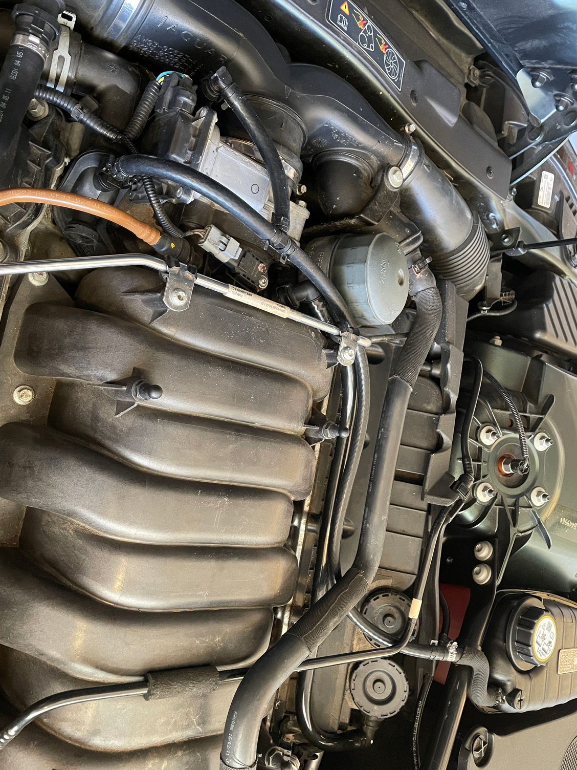 Coolant overflow hose rebuild with silicone rubber on a 2012 XK X150.