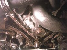 are the top slipper guides upside down, does the slot go to the top? so the chain guard rain is against the timing chain cover?