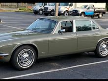 Repainted Fern Grey. Stock chrome wheels powder coated silver with chrome trim rings and hubcaps. 