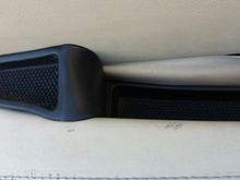 small screw driver or similar tool under an edge and grab with fingers or gently with needle nose pliers.