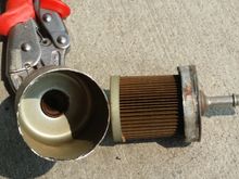 Fuel filter, cartridge removed, inside of canister clean as a whistle, no sediment