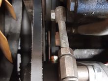 Note how adjuster fouls on new comp. clutch bolts.