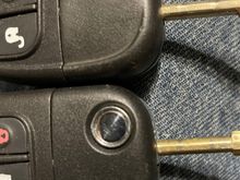 Original key on top.  New key thats hardly worn on the bottom