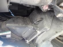 This is an auxiliary radiator for the intercoolers located behind the bumper and in front of the right front wheel well.