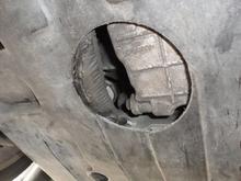 Photo of the undertray installed. As you can see I should have placed the hole about 2" further right and about 2"-3" further toward the rear to center the valve in the hole.