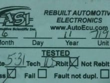 ASI repair label stuck on cover of ECM.