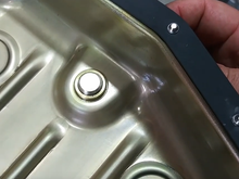 thread the pan bolts partially into the gasket like this to keep the gasket in place