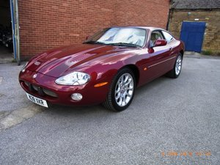 Carnival Red XKR, 2002, 4L X308 Coupe soon to go to my brother.