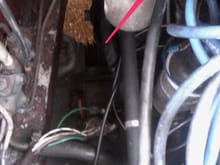 four more pictures in my exciting radiator with pink arrows collection. this guy to the thin pipe that runs over the cowl/hood on the raditor?