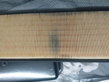 1989 Jaguar XJS convertible - outside of air filter baffle and why it's got a smug of black after only being run a few miles (albeit really hard few miles)...