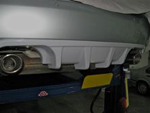 Here is how it arrived. I chose to have it already in primer. If anyone considers doing a swap on an XK a swap to the exhaust tips is a must.