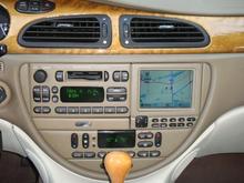 Navigation, 6 disc cd, AM/FM radio AND a cassette player too?  Sweet!