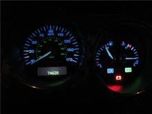 Blue Instrument Panel. This wasn't intentional. I replaced the standard bulbs with white LED bulbs. The LED bulbs make the instrument panel look blue.