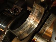 Debris from spun bearing in rear of motor working it's destruction on the other bearings.