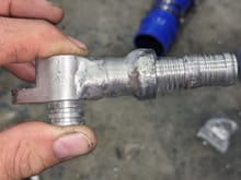 Suction line fitting