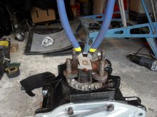 A decent pair of circlip pliers are required to release the circlip.