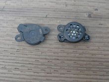 This is a front and back view of the beeper- speaker for the parking assist.