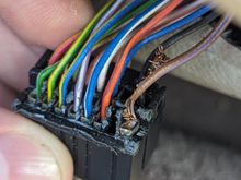 fraying at base of harness