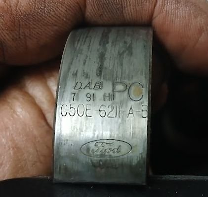 the first picture is the mains bearing cap.