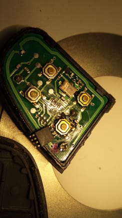 The IC chip came unsoldered and there is black goop under the lock and unlock buttons.