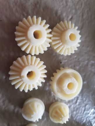 Gears are chipped and a bit ROUGH.  What lube would work on resin?