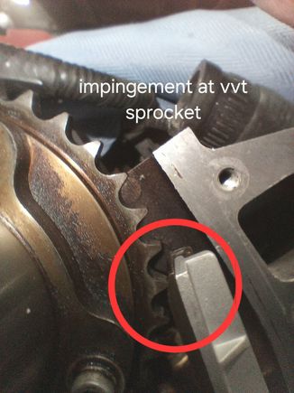 This is not bolted in, just riding on pin. The rib also interferes with the cover here.