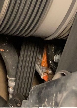 Coolant collection at front engine cover.