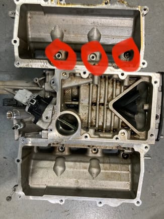 This is from a 3.0 V6 but since yours is an 8, this is all we got here. The photo shows 3 (circled) bolt holes but yours will have 4 on each side. Get those 8 bolts out. 