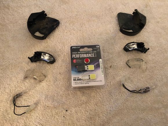 The LEDs I chose are made by Pilot, size 194. These are incredibly thin, and fit inside this very confined space perfectly. Removing the clear lenses from the housings is by far the biggest challenge. Using a small flat screwdriver, gently, but firmly pry the lens from the housing. It is almost guaranteed it will not come off in one clean piece. These are not designed to ever be taken apart. Expect some cracking, and small bits of the plastic housing to remain attached to the clear lens.
