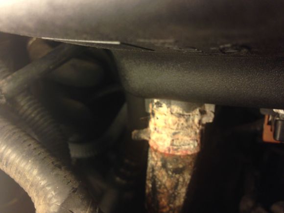 Bottom of coolant reservoir, right side