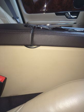 Here is where the cables tuck into the centre arm rest to go to a mulri accessory socket unit to power the units.