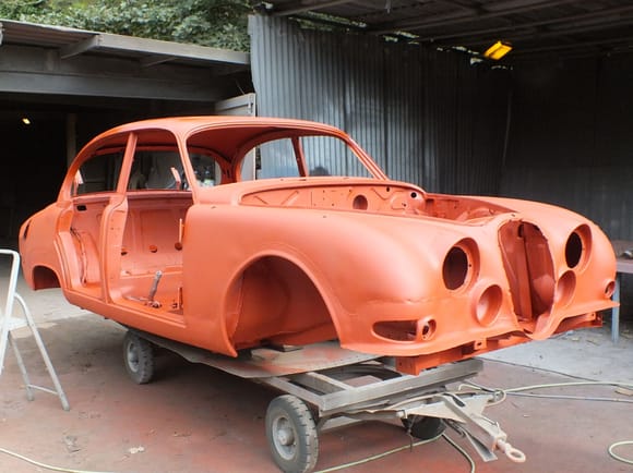 Shell after blasting with a red oxide paint protection to be transported back to the workshop.