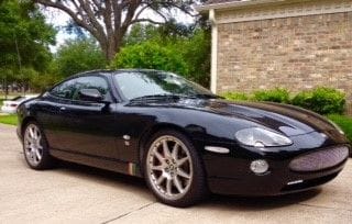 2005 XKR Coupe with 20" BBS Montreal Wheels,
Ebony with Ivory Interior and Clear Side Marker  & Clear Repeater Lens
