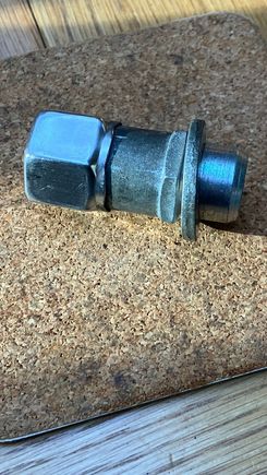 Spare lug nut with decorative cap in place