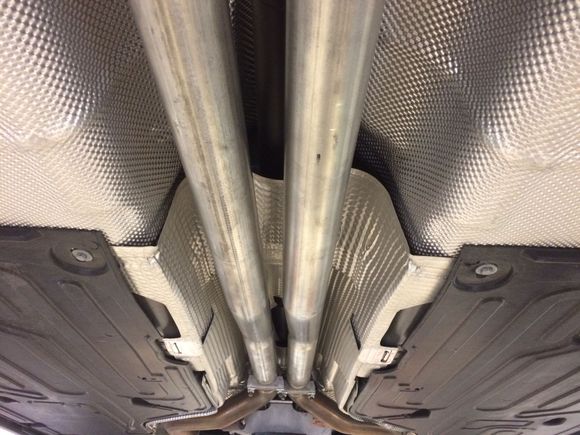 New pipes looking forward to front of car.