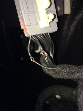 here is a close-up of the mirror wire harness. It is PIN #12 for ground and PIN #13 for +12 volts. This is where I carefully cut and exposed the conductors inside the wire and make a loop with a pick. This keeps the factory wiring intact and the same length so everything reinstalls properly.