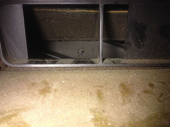 Here you can see the defrost flap where it had fallen into the heater box. I took this pic through the center vent hole