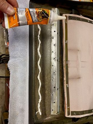 I ground the "crimps" off of the metal strip since they were now in my way. I thought of using JBWeld, but decided on the Gorilla glue since it claims it will adhere to almost anything. 