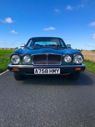 Front on view of my Classic Jaguar XJ6 Series 3 - 4.2L and it looks great and very fitting in the English Countryside