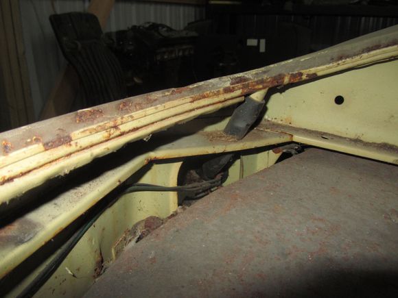 left side still see drain and wires to tail light and to reverse light: This is left side of car