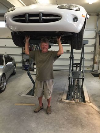 72" lift height.  I'm 74 and too old to be crawling around under cars; but the lift has given me another ten years working on my car hobby.

PS.  Apologies to original poster.  Didn't mean to hijack the thread w/ a pic.  