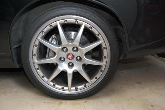 20" BBS Montreal wheels w/hidden valve stem, Brembo R brake option w/ drilled rotors and silver Jaguar-logo calipers, red wheel center