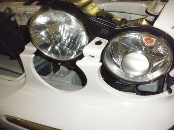 Wiggle Headlamp Assy to gain access to Harness connector.