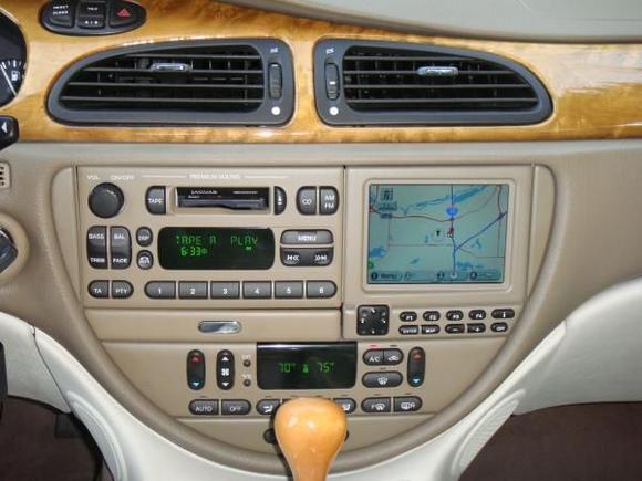 Navigation, 6 disc cd, AM/FM radio AND a cassette player too?  Sweet!